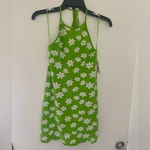 Green dress with white flowers, halter neckline